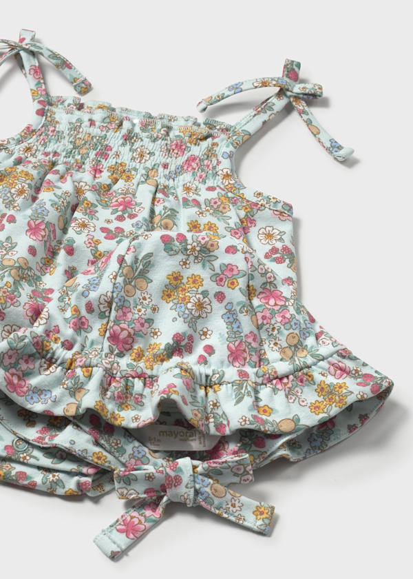 Pagliaccetto con cappello a fiori