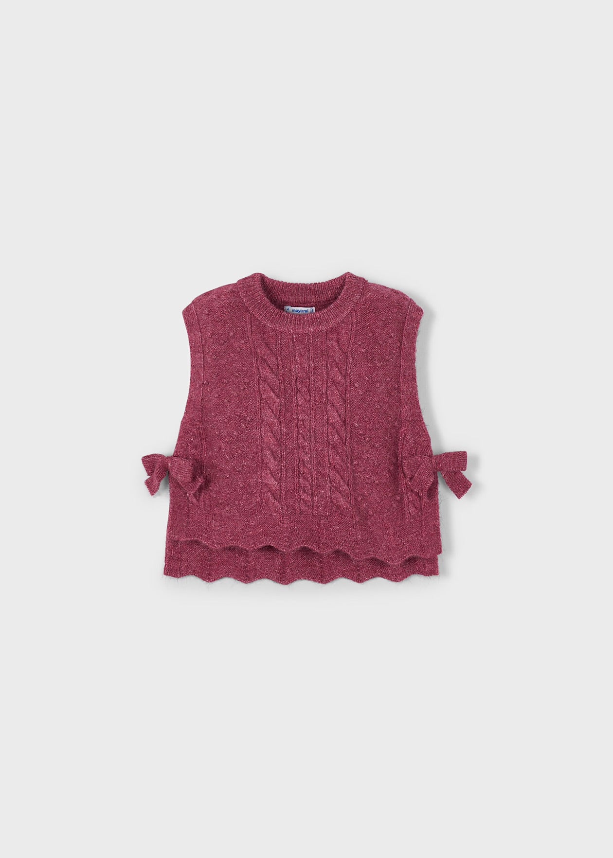 Gilet tricot con fiocchetti