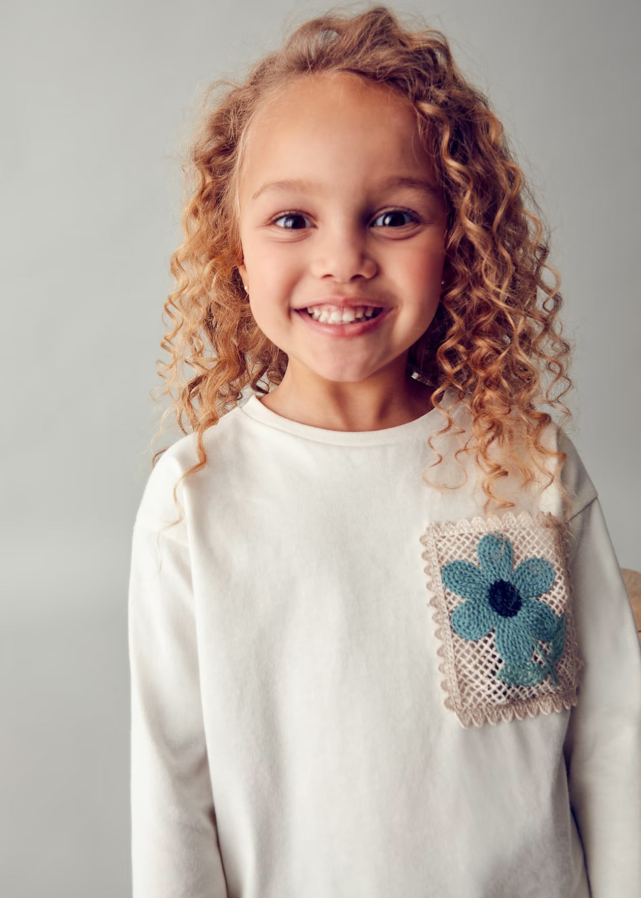 Maglietta con tasca crochet