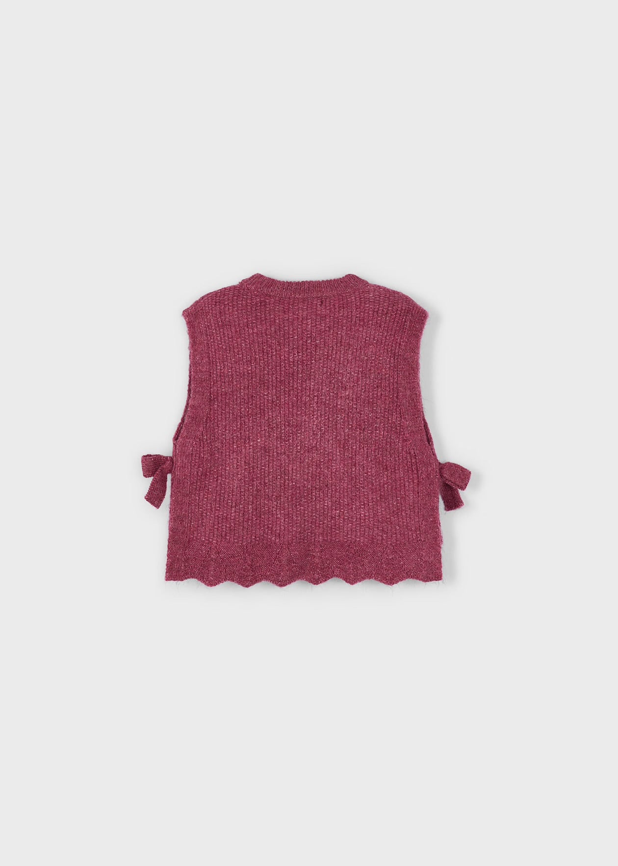 Gilet tricot con fiocchetti