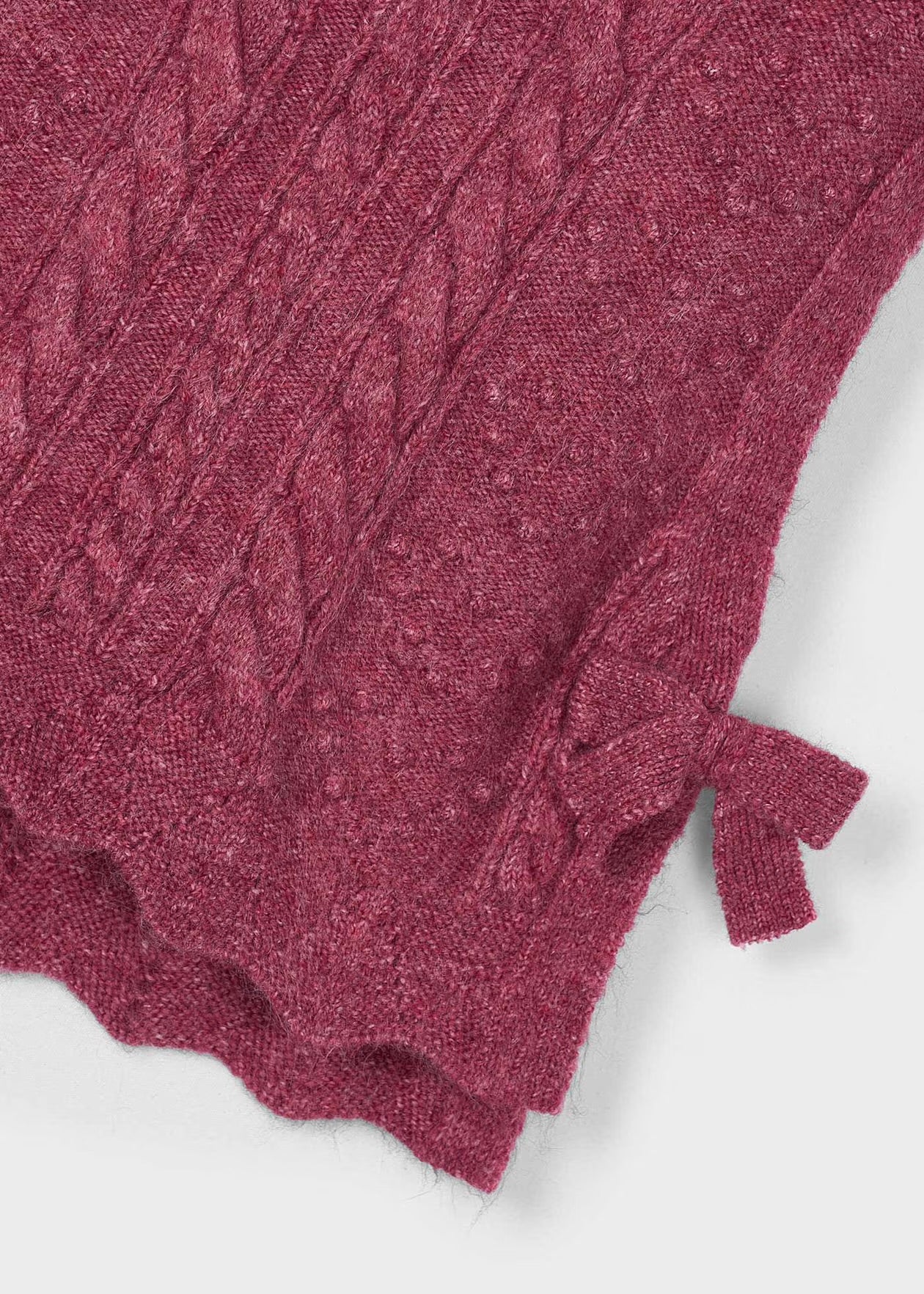 Gilet tricot con fiocchetti