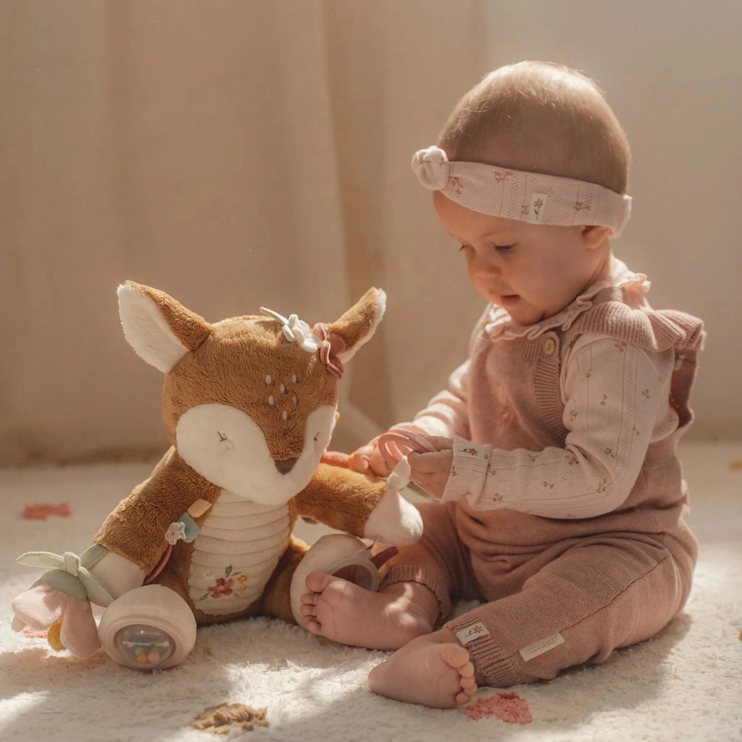 Peluche multi-attività