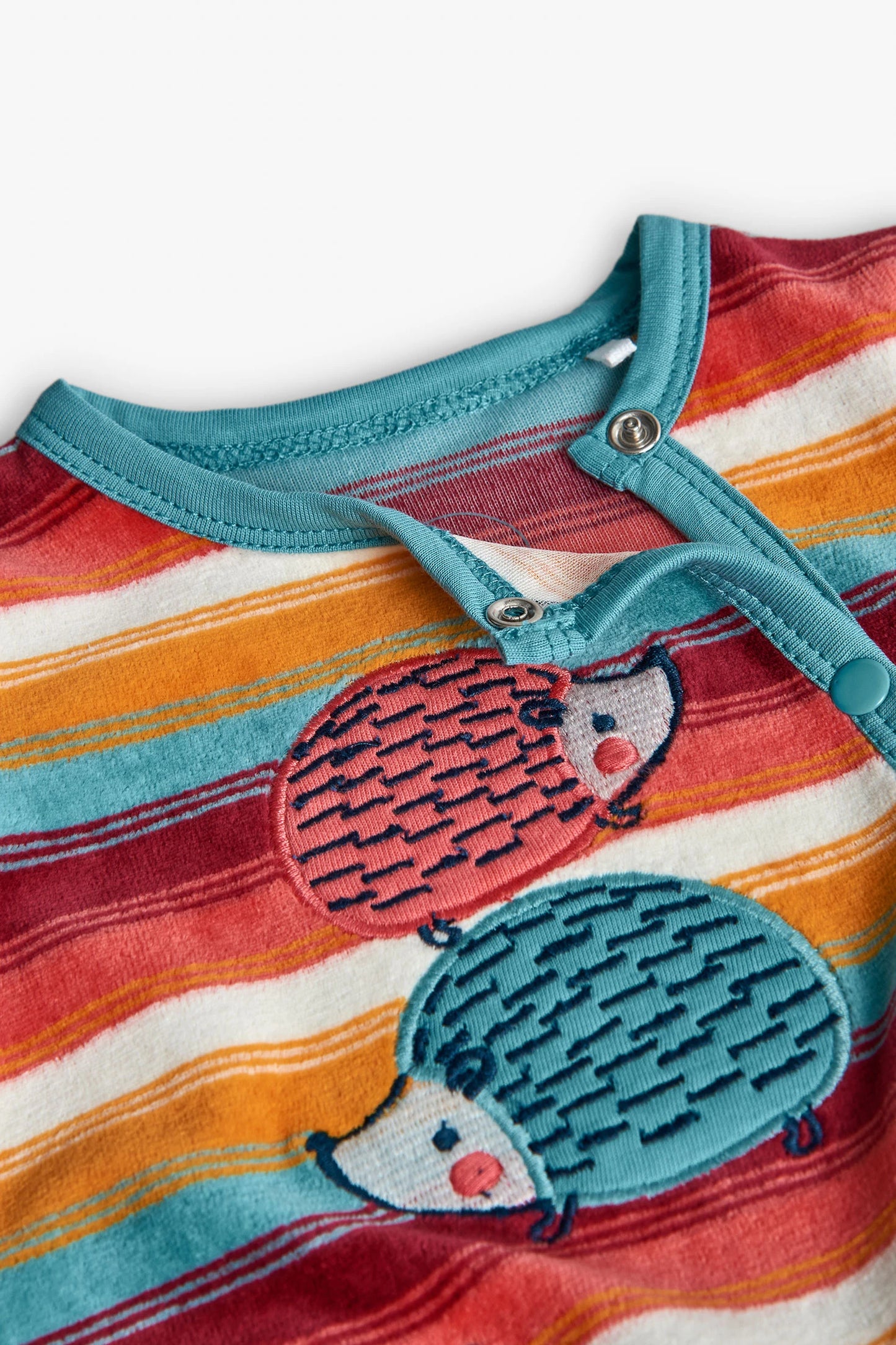 Tutina in ciniglia a righe